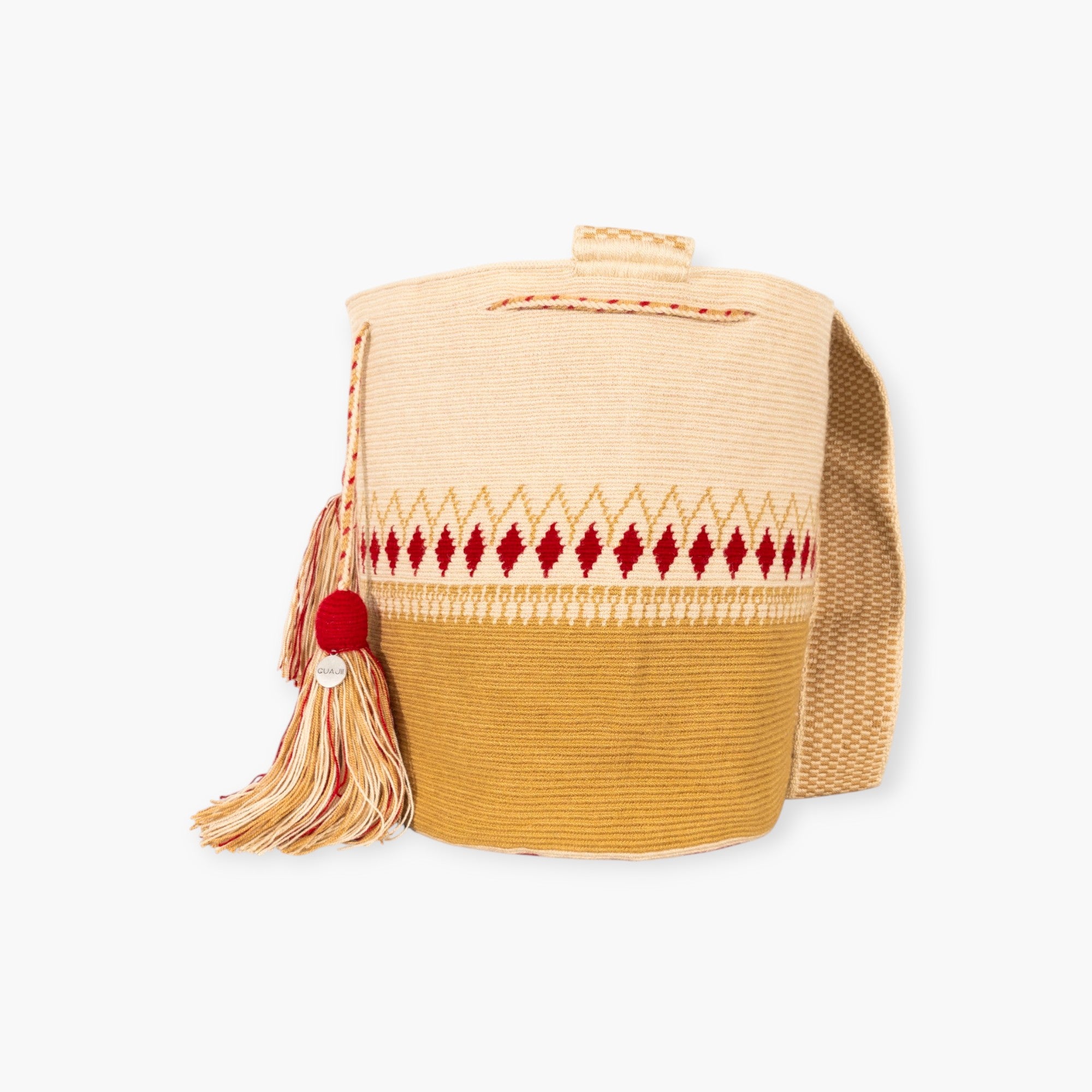 Woven handbag with geometric pattern and tassel on a white background